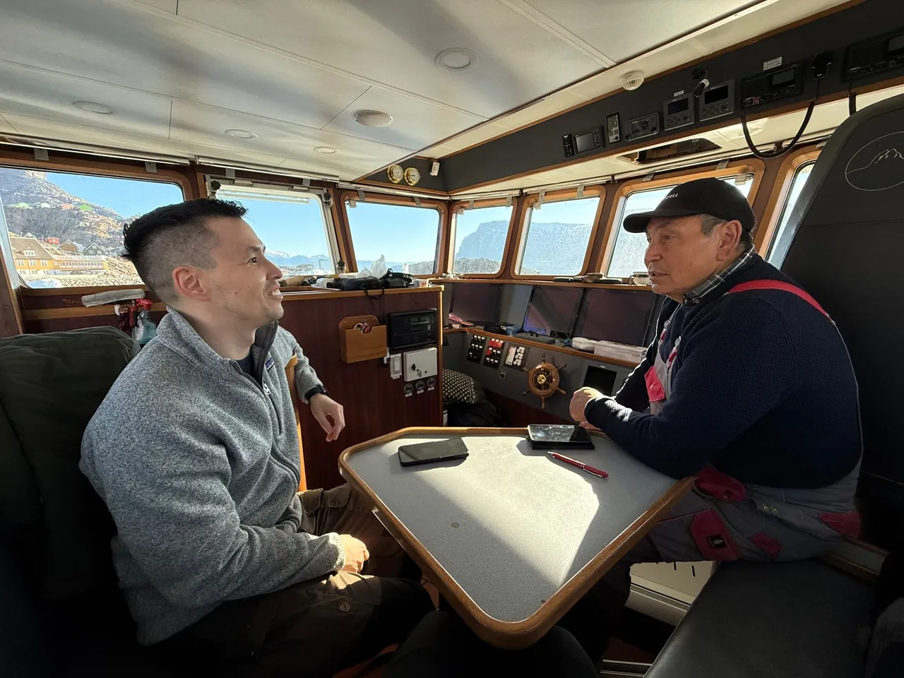 Conversation with fisherman Svend Løvstrøm aboard his boat in Uummannaq